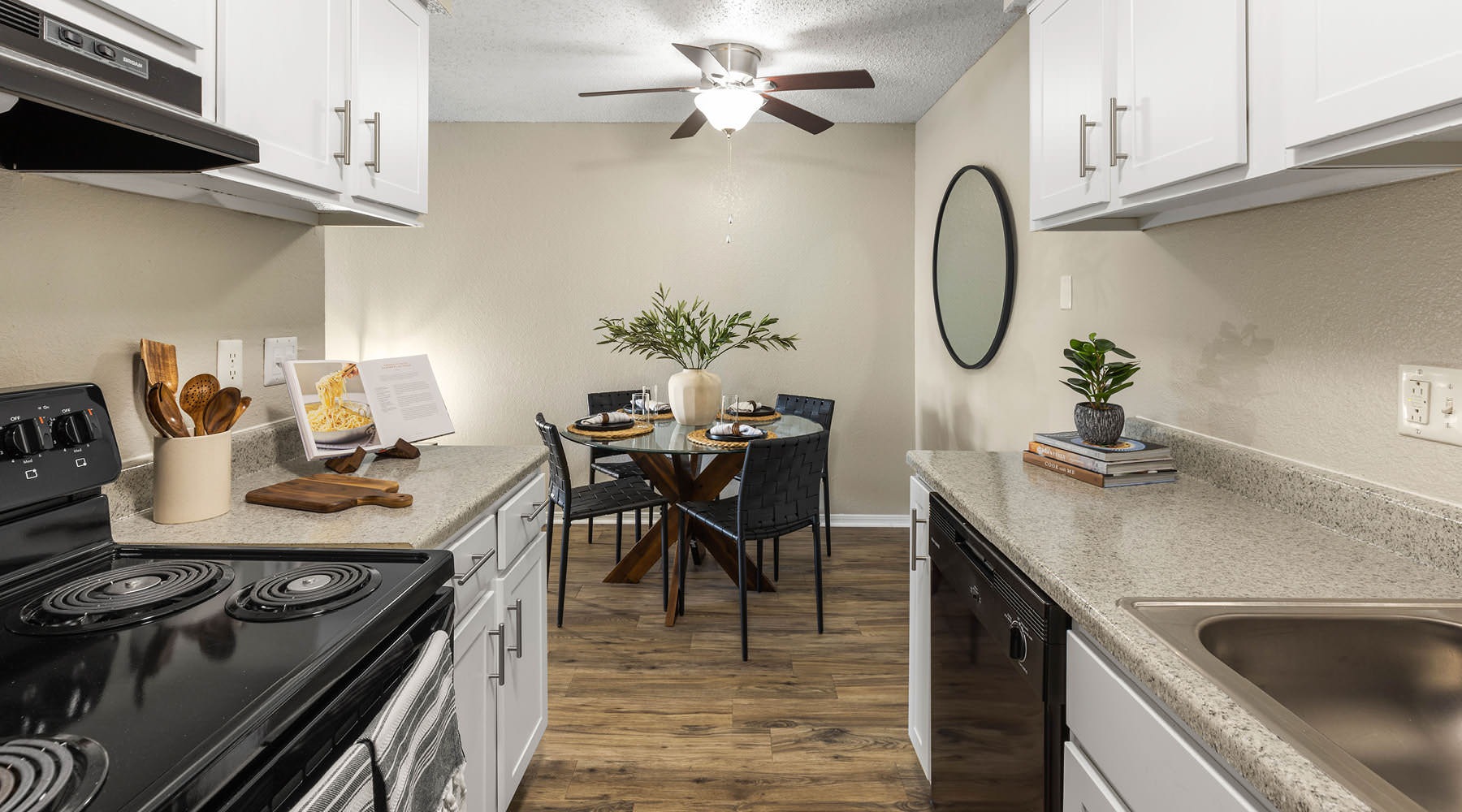 galley kitchen open to dining area