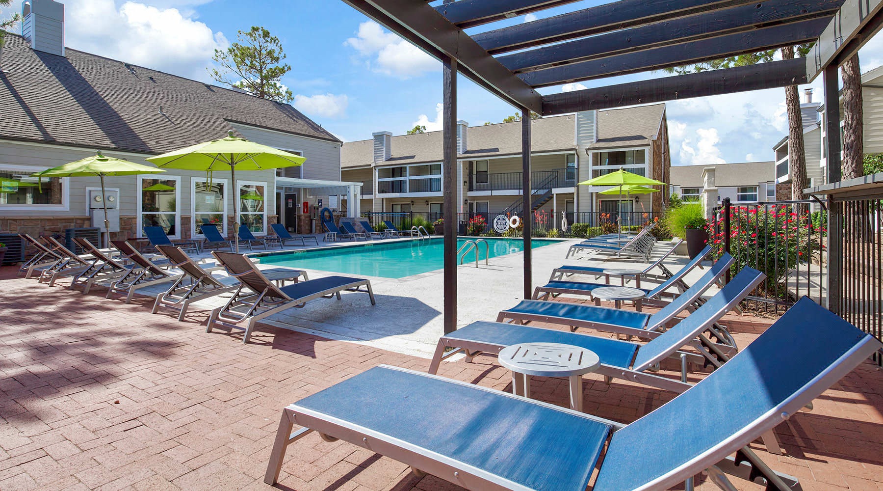shaded loungers poolside
