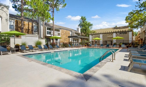 Outdoor pool at Woodland Trails apartments in Oklahoma City, OK.
