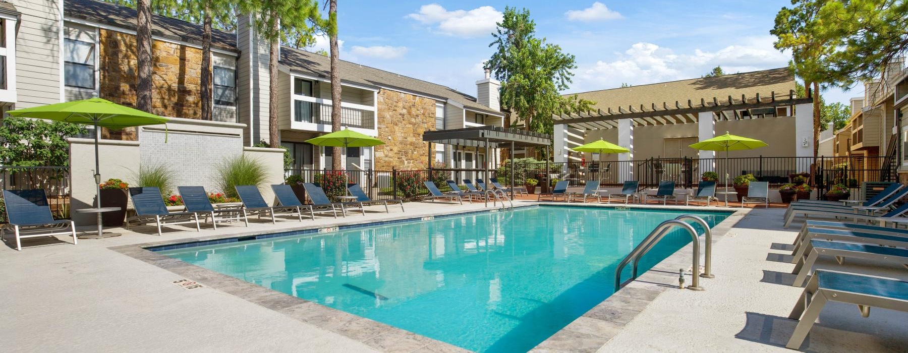 Outdoor pool at Woodland Trails apartments in Oklahoma City, OK.